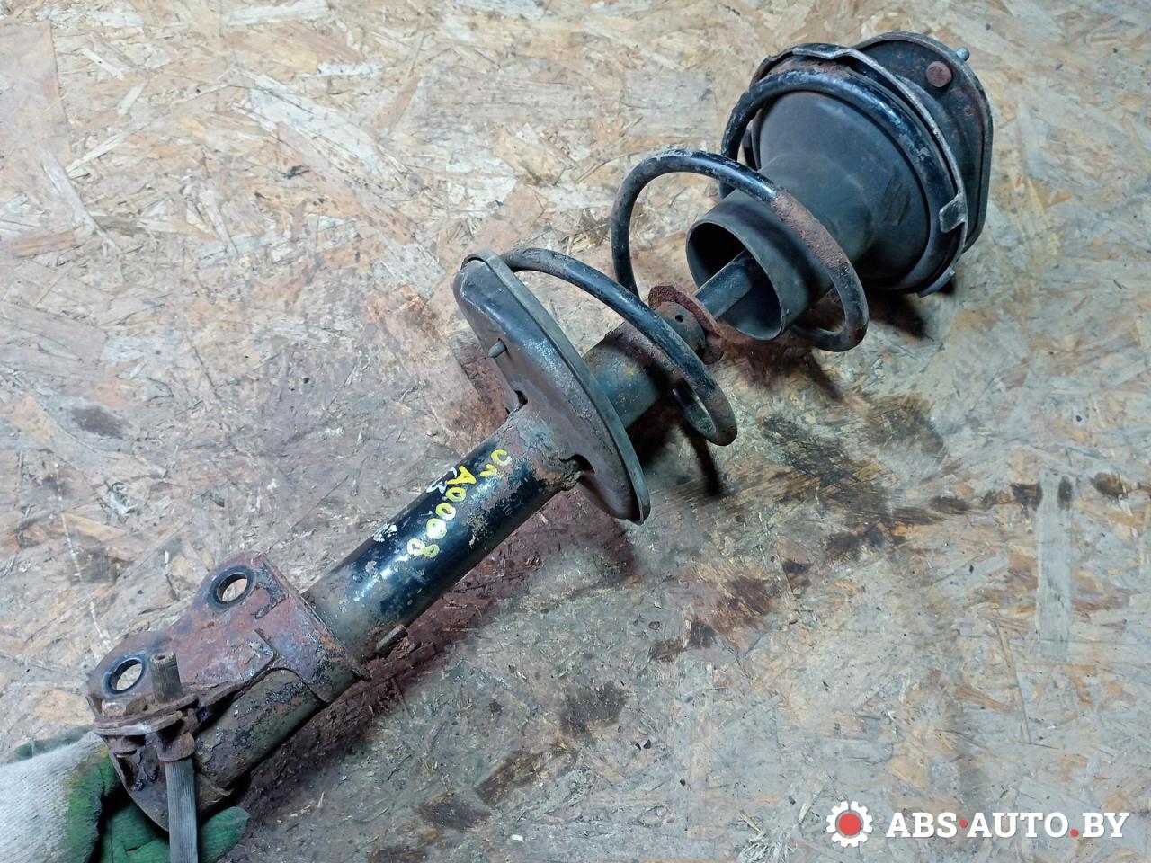 стойка передняя правая Toyota Corolla 7 поколение (E100) 1997, 1.6 л., бензин, 4851012840 - фото №1