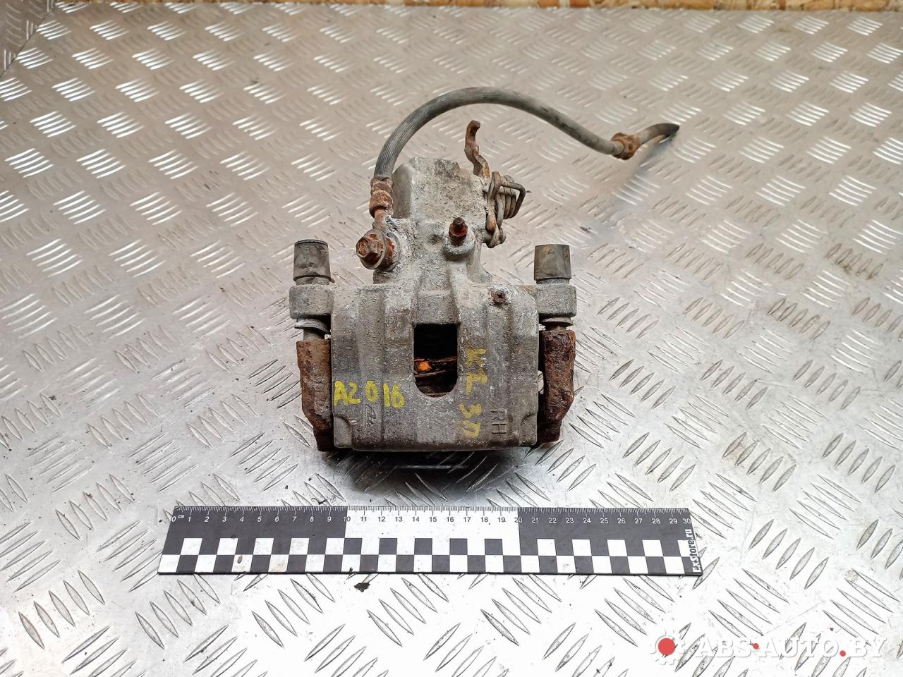 суппорт задний правый Nissan Primera P12 2003, 2.2 л., дизель, МКПП, универсал - фото №1