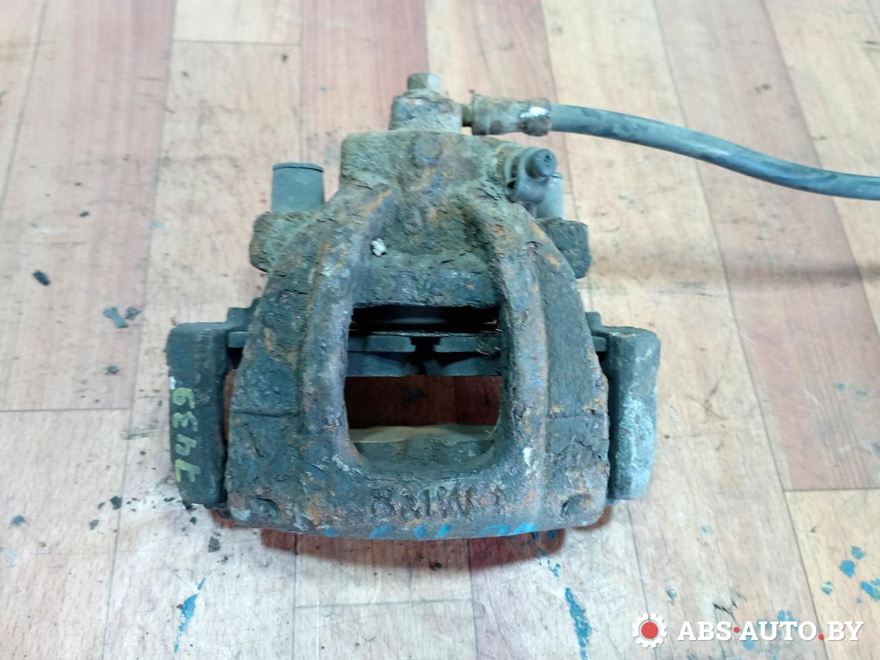 суппорт передний левый Mini Cooper 1 поколение 2003, 1.6 л., W10 B16 A, бензин, МКПП - фото №1