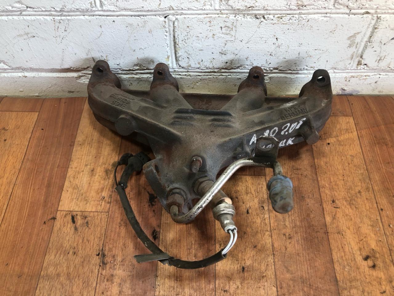 коллектор выпускной Audi 80 B3 1992, 2.0 л., mono, бензин, 048129, 591E - фото №1