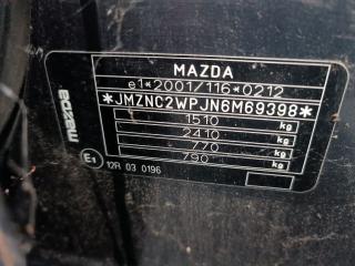 Mazda 2 1 поколение