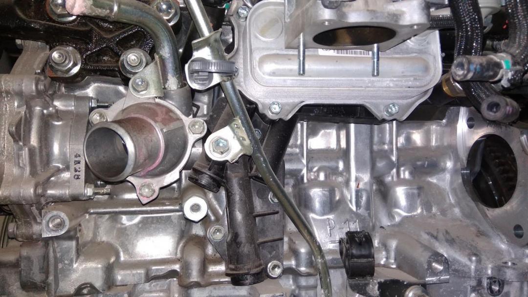 теплообменник масляного фильтра Toyota RAV4 4 поколение (CA40) 2014 - фото №1