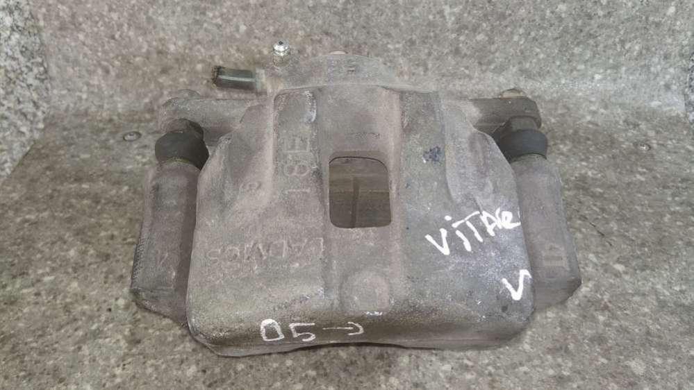 суппорт передний левый Suzuki Grand Vitara 2 поколение 2008 - фото №1