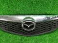 решетка радиатора Mazda 2 1 поколение [рестайлинг] 2006 - фото №2