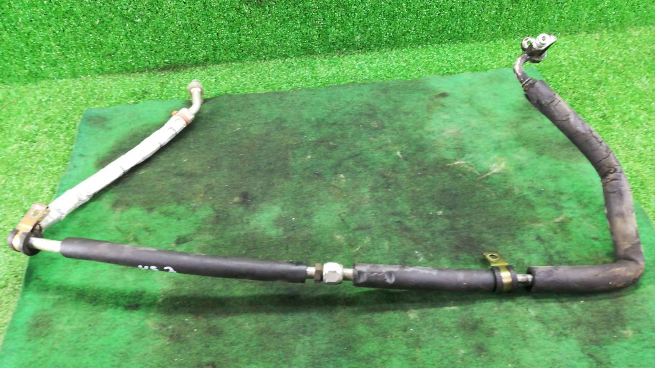 трубка кондиционера Chevrolet TrailBlazer 1 поколение 2005, 4.2 л., бензин, АКПП, черный, внедорожник 5 дв., задний привод - фото №1