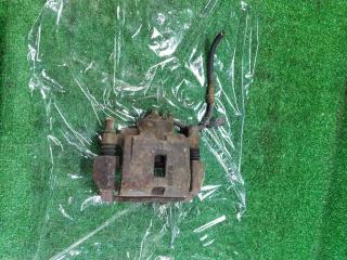 суппорт передний левый Mazda 626 GE 1993, 2.0 л., дизель, МКПП, хетчбэк 5 дв.