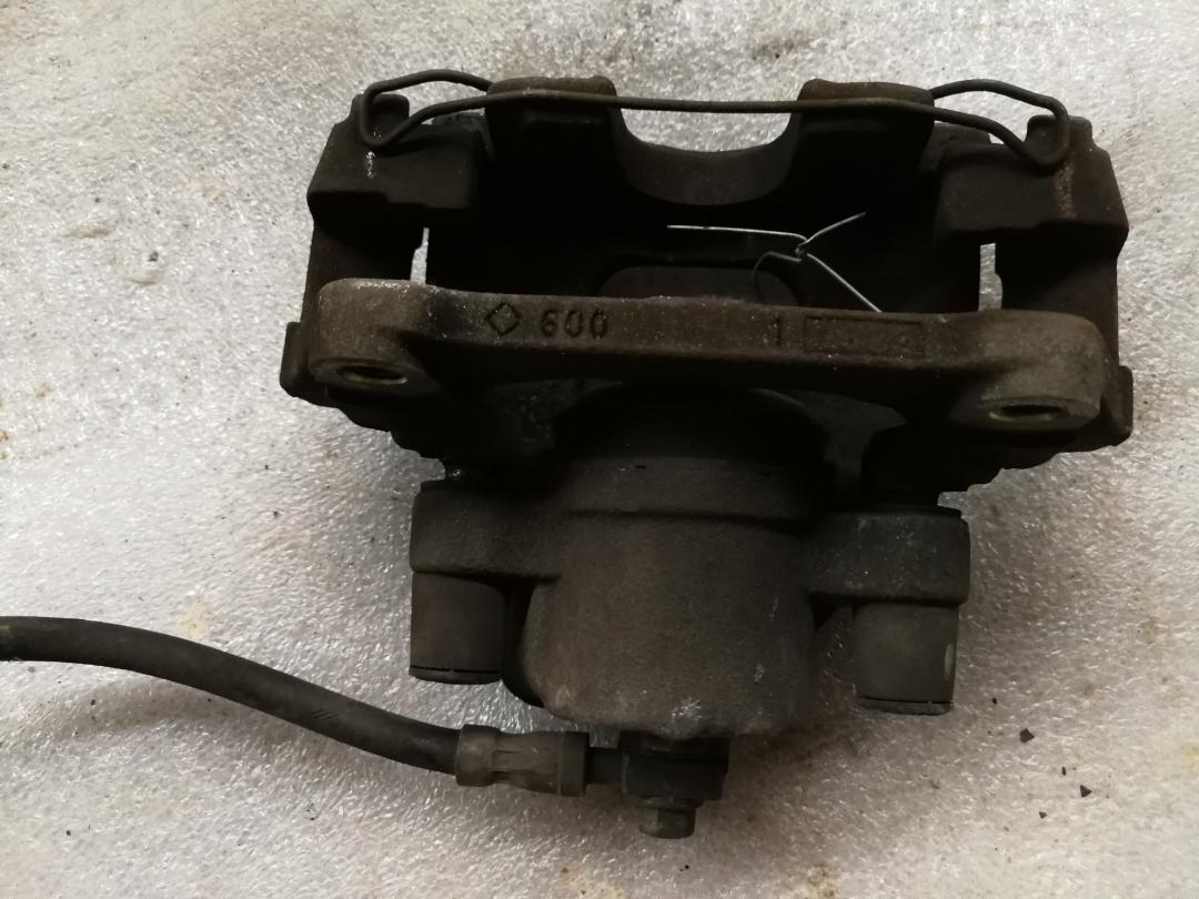 суппорт передний левый Mini Cooper S 1 поколение 2004, 1.6 л., W10 B16 A, бензин, АКПП, хетчбэк 5 дв. - фото №1