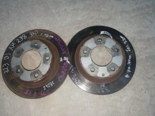 диски тормозные задние Mazda 323 6 поколение [рестайлинг] 2001, 2.0 л., FS7E, бензин, АКПП, желтый, хетчбэк 5 дв., правый руль