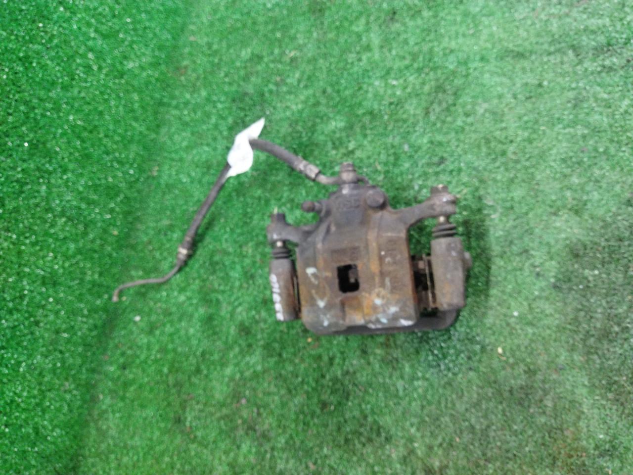 суппорт задний правый Mazda Millenia 1 поколение 2000 - фото №1