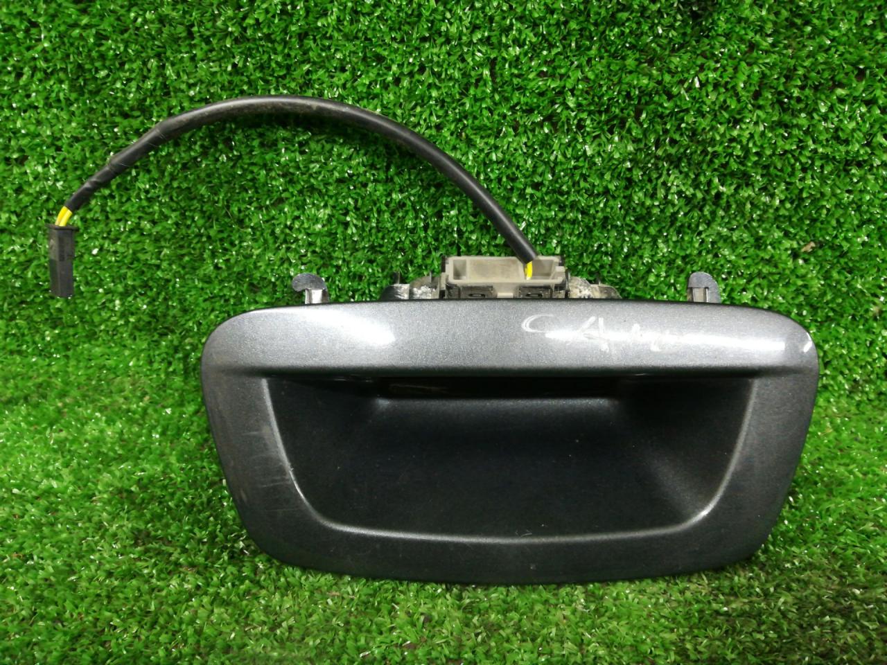 кнопка открытия багажника Chevrolet Trax 1 поколение 2014, 1.4 л., бензин, АКПП, хетчбэк 5 дв., передний привод, 772508AA - фото №1