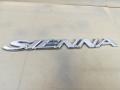 эмблема Toyota Sienna 2 поколение XL20 [рестайлинг] 2009, 3.5 л., 2GR-FE, бензин, АКПП, красный, минивэн, передний привод - фото №2