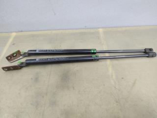 амортизатор крышки багажника (3-5 двери) Mazda 626 GE [рестайлинг] GE 1995, 1.8 л., i, FP, бензин, МКПП, черный, хетчбэк 3 дв., передний привод