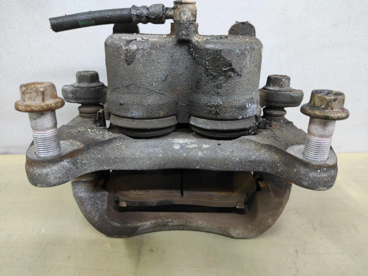 суппорт передний левый Mazda CX-9 2 поколение TC 2020, 2.5 л., PY-VPS, бензин, АКПП, внедорожник 5 дв., полный привод - фото №1