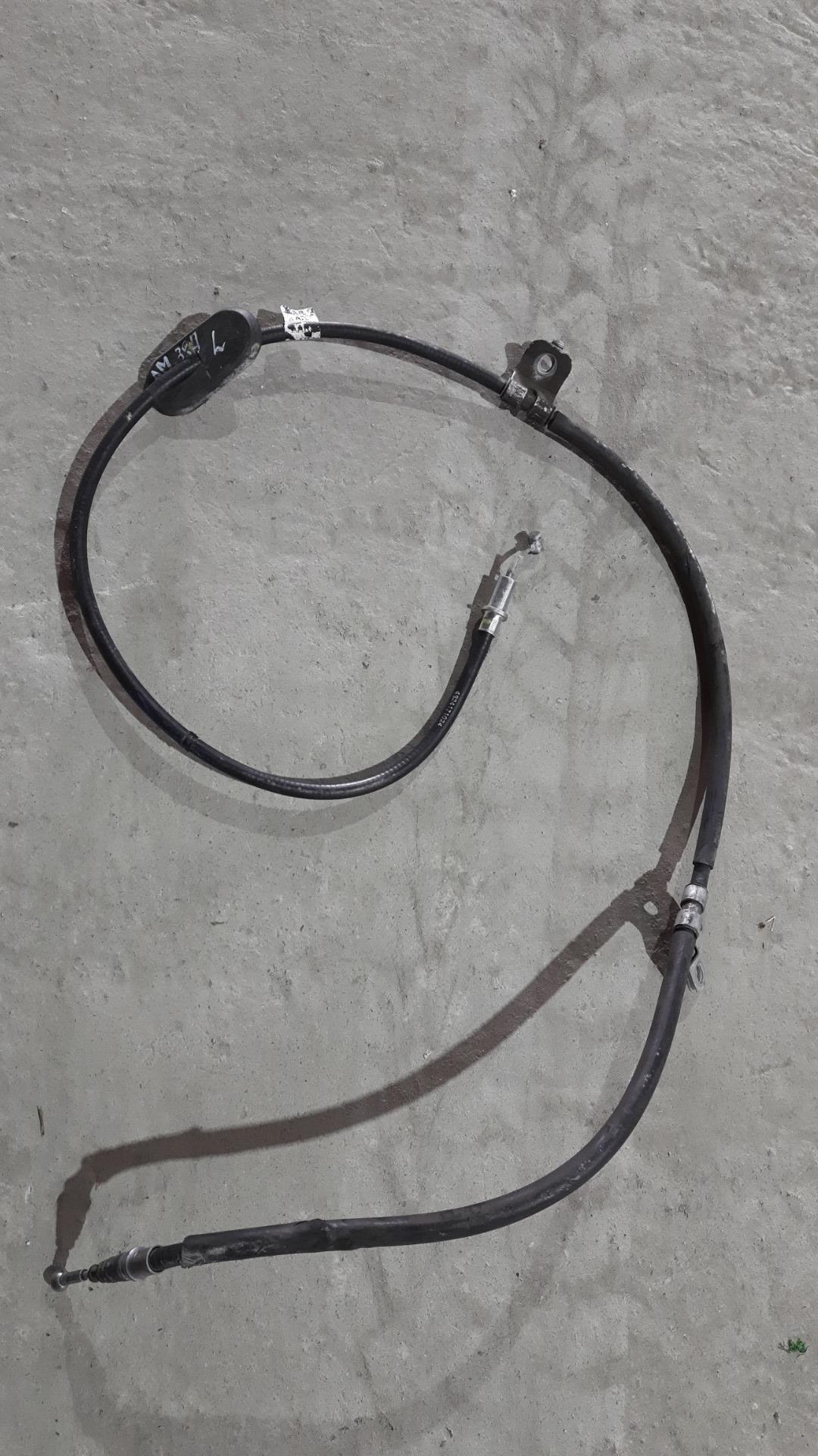 трос ручника Chevrolet Traverse 2 поколение 2019 - фото №1