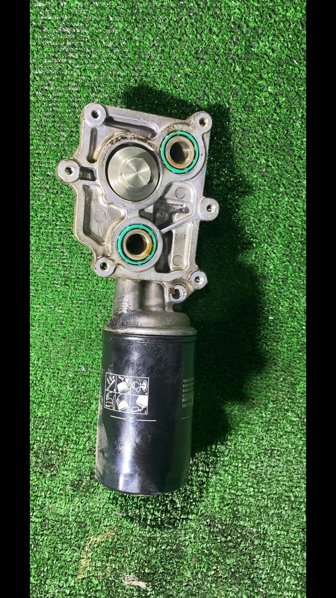 корпус масляного фильтра Mazda CX-9 1 поколение 2008, 3.7 л., CA, бензин, АКПП, полный привод, правый руль - фото №1