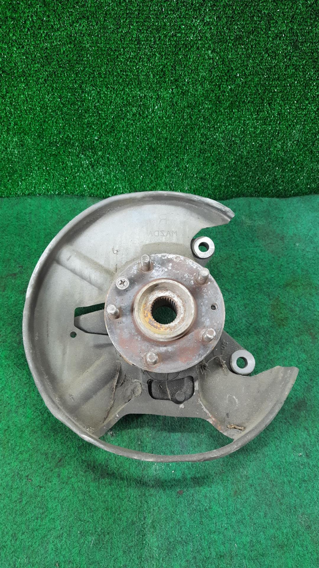 кулак поворотный правый Mazda CX-7 1 поколение 2007 - фото №1