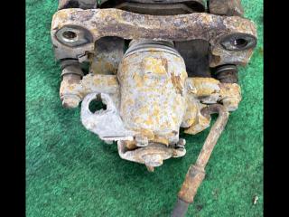 суппорт задний левый Dodge Grand caravan 5 поколение 2010, 3.6 л., бензин, АКПП, минивэн, передний привод