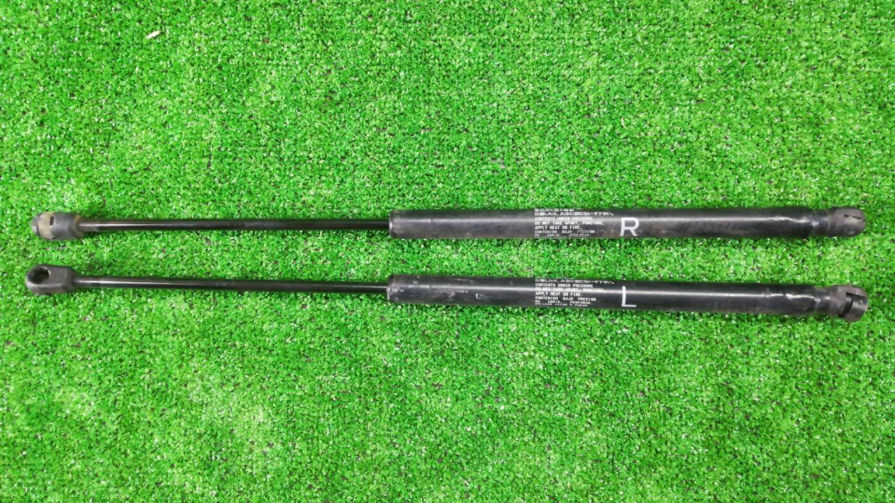 амортизатор крышки багажника (3-5 двери) Mitsubishi Outlander 2 поколение 2008, 3.0 л., i, 6B31, бензин, красный, внедорожник 5 дв., полный привод, 5802A007, 5802A008 - фото №1