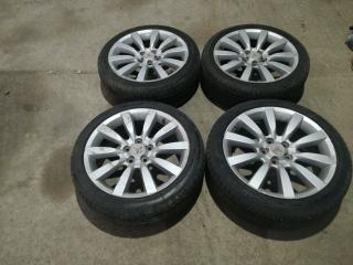 диск литой Mitsubishi Lancer 10 поколение 2010, 2.4 л., 4B12, бензин, АКПП, белый, хетчбэк 5 дв., передний привод