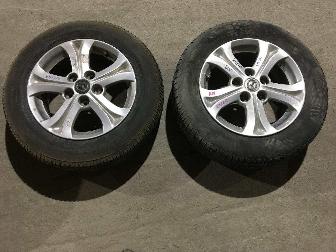 диск литой Mazda 3 BL 2010, 1.6 л., Z6, бензин, АКПП, белый, хетчбэк 5 дв., правый руль - фото №1