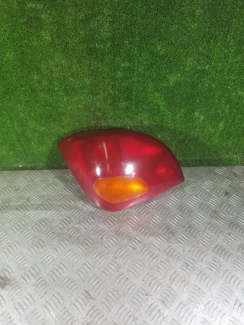 фонарь задний левый Ford Fiesta 4 поколение 1997, 1.3 л., бензин, МКПП, хетчбэк 5 дв. - фото №1