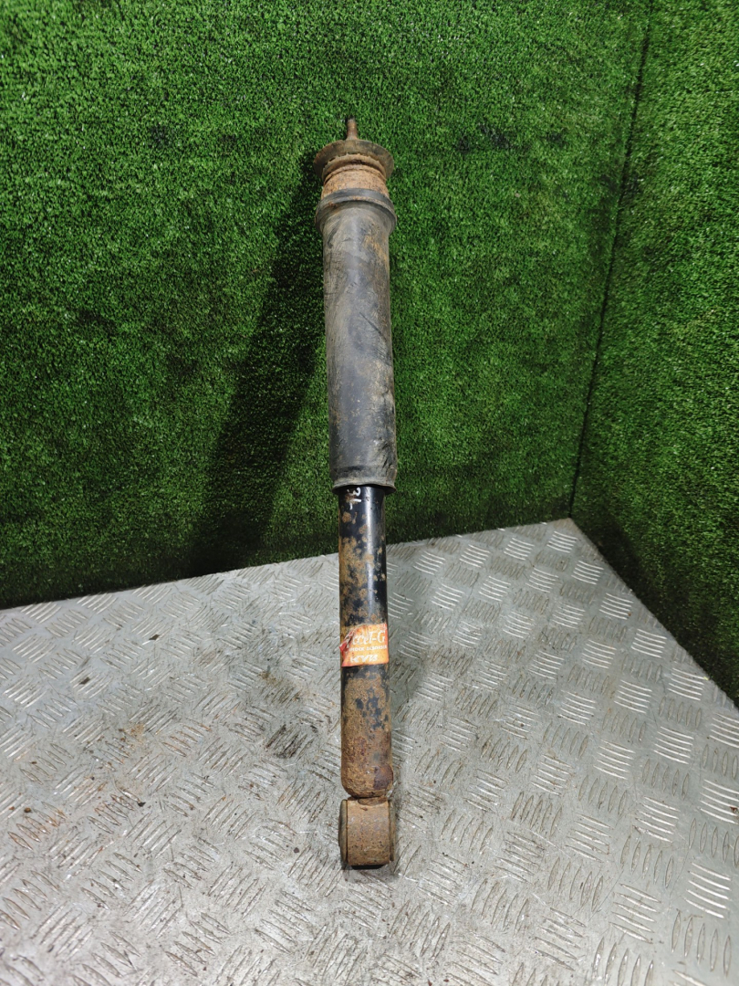 амортизатор задний левый Mitsubishi Space Wagon 3 поколение (Typ N50) 2000, 2.4 л., GDi, бензин, МКПП, минивэн - фото №1