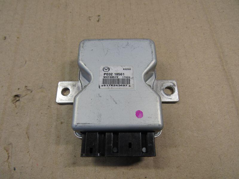 блок управления топливным насосом Mazda CX-5 1 поколение 2014, 2.0 л., дизель, PE0218561 - фото №1