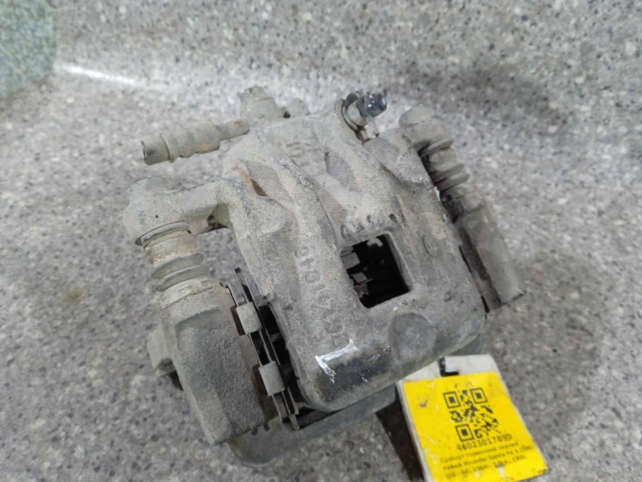 суппорт задний левый Hyundai Santa Fe 1 поколение (SM) (2000 - 2004), 2.0 л., CRDi, дизель, полный привод - фото №1