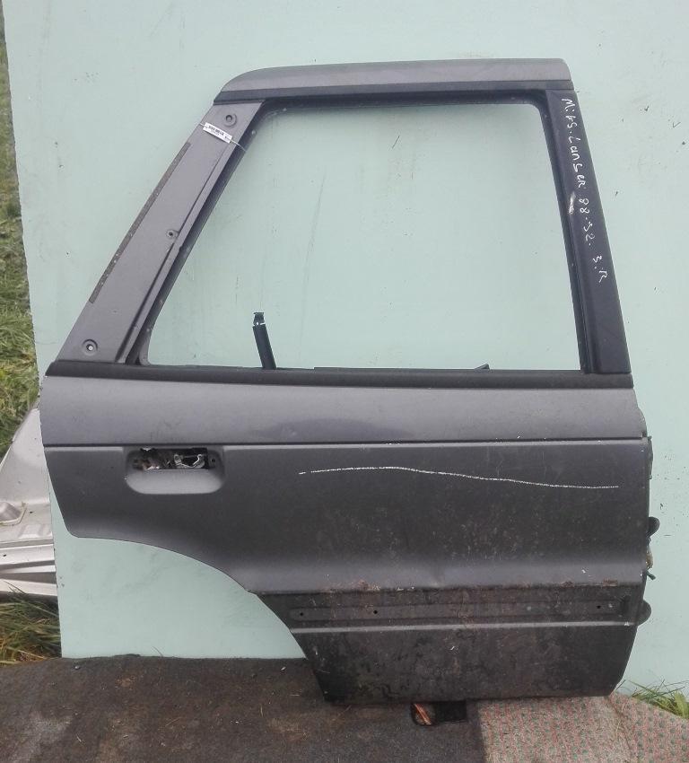 замок двери задней правой Mitsubishi Lancer 4 поколение 1990, серый, хетчбэк 5 дв. - фото №1