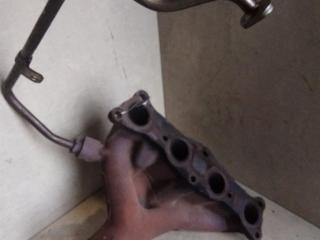 коллектор выпускной Mazda 323F BA 1996, 1.5 л., i, Z5-DE, бензин, МКПП, зеленый, хетчбэк 5 дв., передний привод, B67K13450A