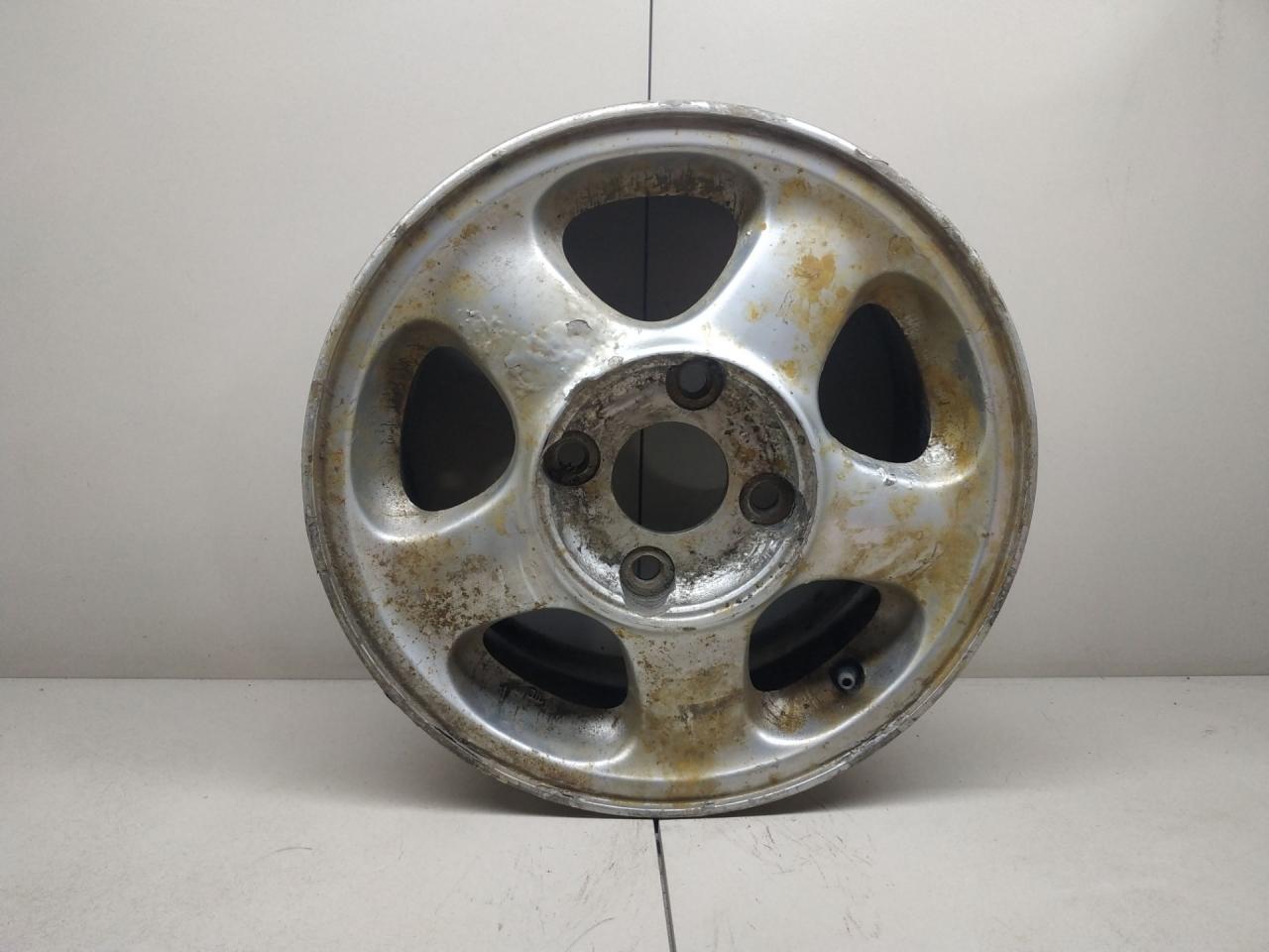 диск литой Nissan Primera P10 1994 - фото №1