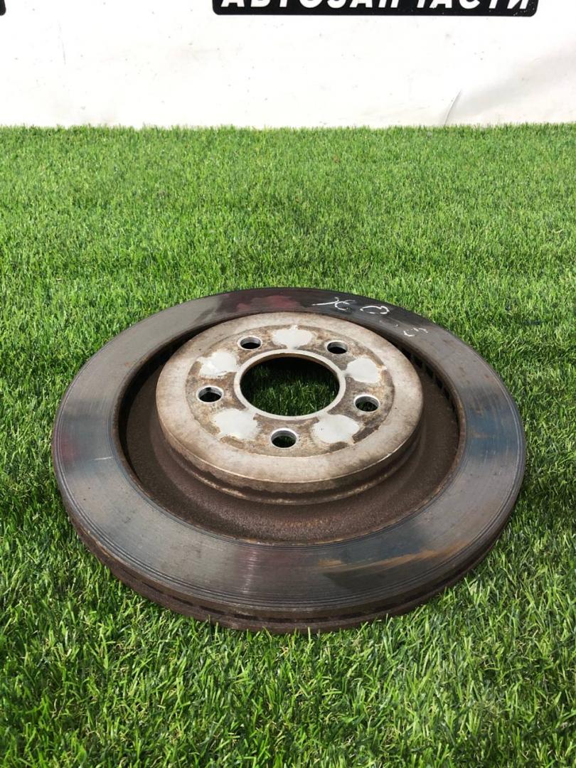 диск тормозной задний Ford Mustang 6 поколение S550 2016, 5.0 л., бензин, МКПП, серый, купе, задний привод - фото №1