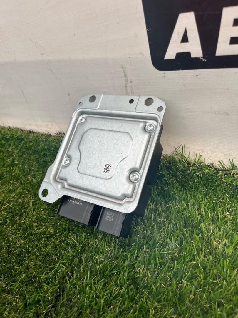 блок AirBag Tesla Model X 1 поколение 2018, электро, хетчбэк 5 дв., 1036767-00-A - фото №1