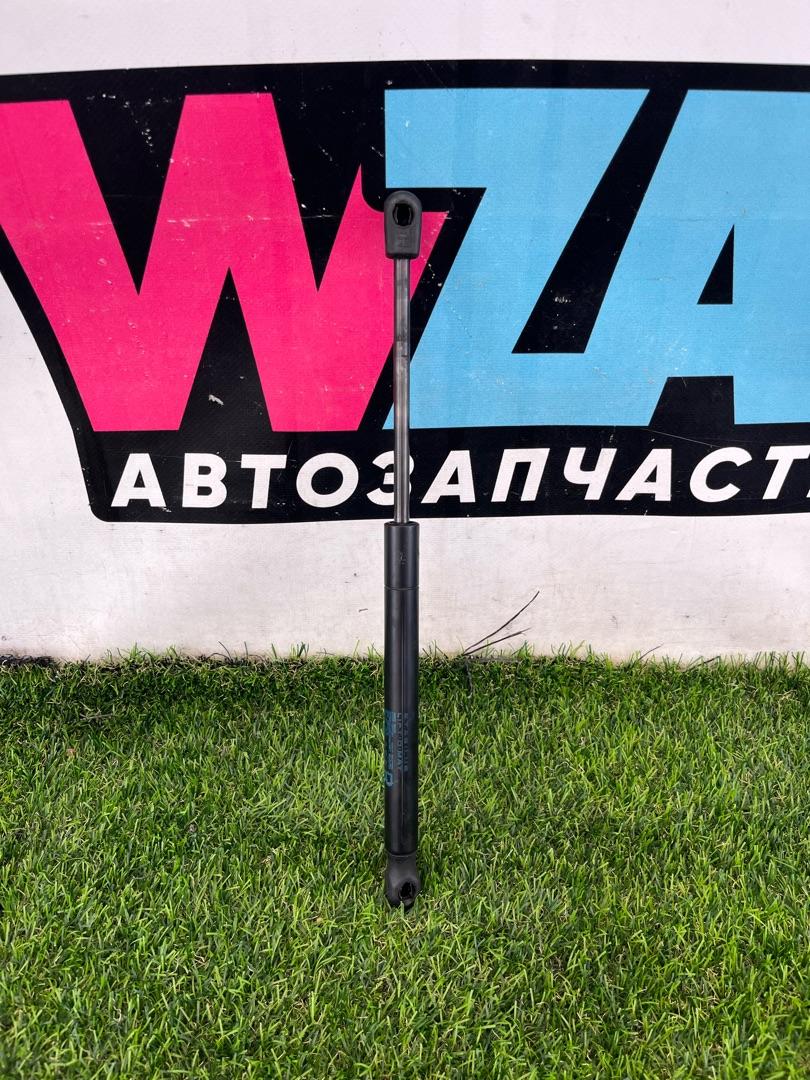 амортизатор капота Tesla Model X 1 поколение 2018, электро, хетчбэк 5 дв., 1053606-00-B - фото №1