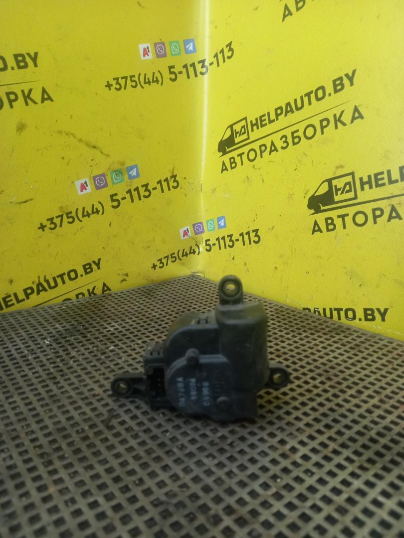 моторчик заслонки печки Dodge Caravan 3 поколение 1998, 2.4 л., i, EDZ, бензин, АКПП, минивэн - фото №1