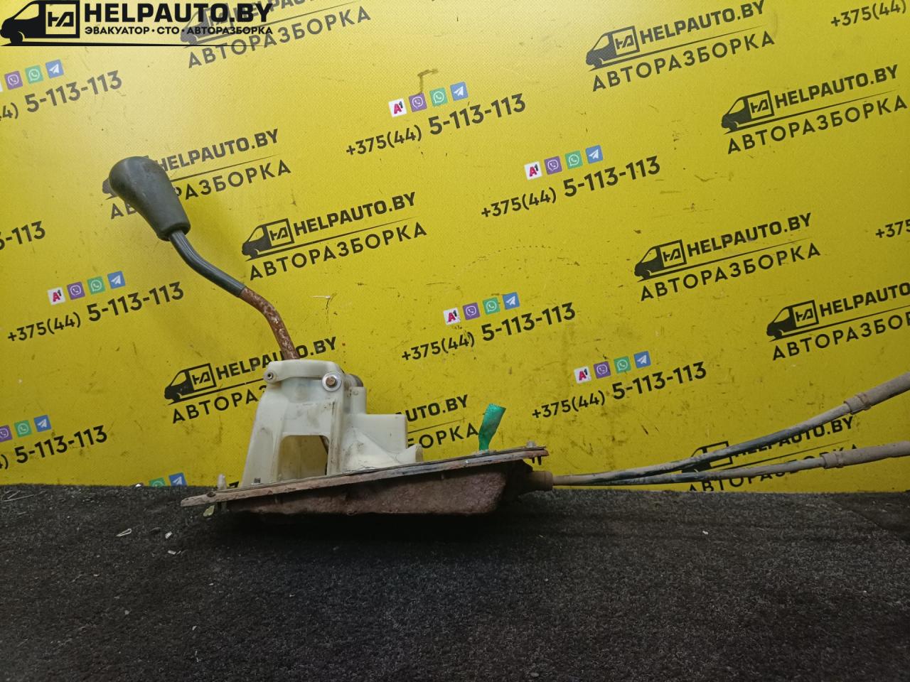 кулиса Toyota Carina E 1 поколение T190 1997, 1.8 л., бензин, МКПП, хетчбэк 5 дв., передний привод, 7A-FE - фото №1
