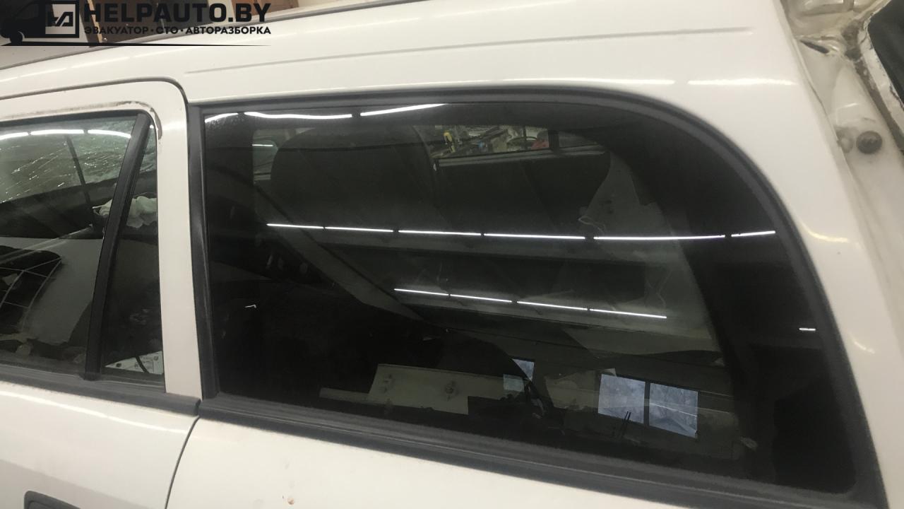стекло кузовное боковое левое Opel Astra G 2001, 1.6 л., бензин, МКПП, универсал, передний привод - фото №1