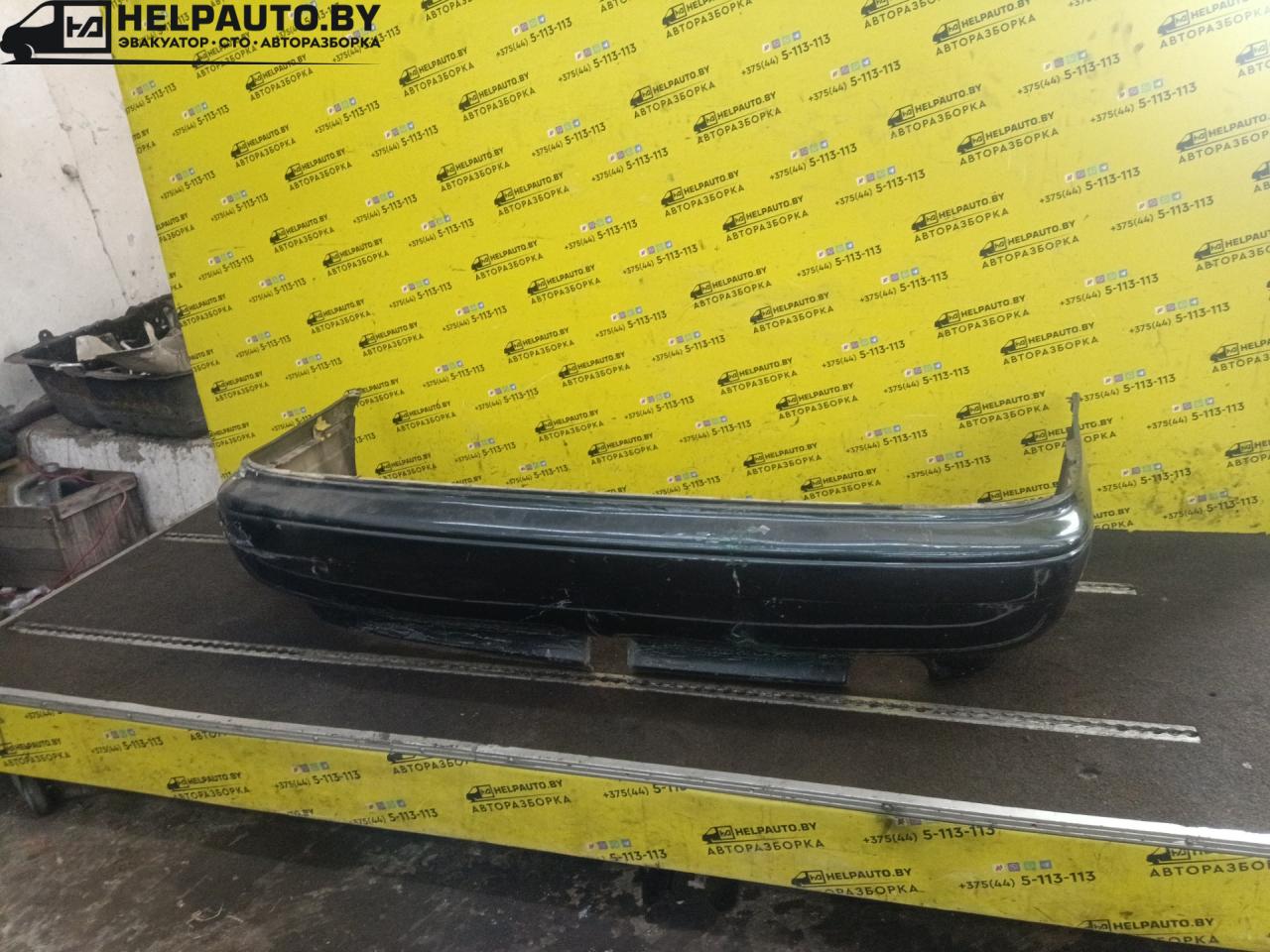 бампер задний Toyota Carina E 1 поколение T190 1997, 2.0 л., дизель, МКПП, зеленый, седан - фото №1