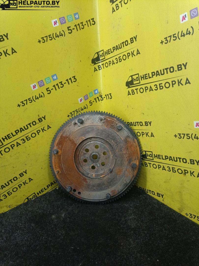 маховик Kia Shuma 1 поколение 1999, 1.5 л., BFD, бензин, МКПП, зеленый, хетчбэк 5 дв., передний привод - фото №1