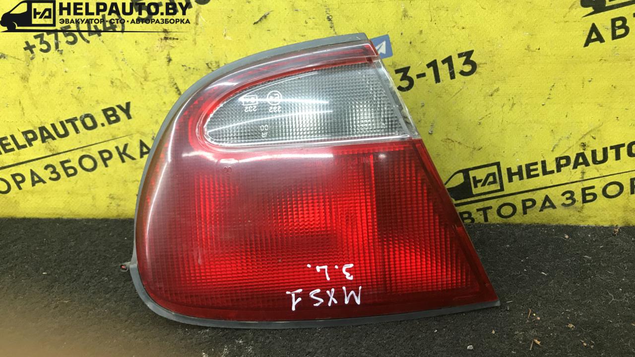 фонарь крышки багажника левый Mazda Xedos 6 1 поколение 1997, 1.6 л., бензин, МКПП, бордовый, седан - фото №1