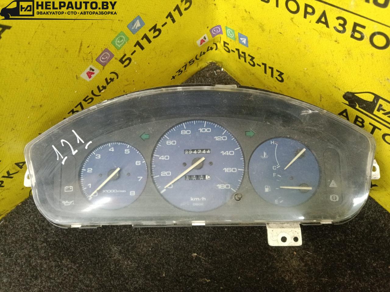 щиток приборов (приборная панель) Mazda 121 2 поколение 1995, 1.3 л., бензин, МКПП, синий, седан - фото №1