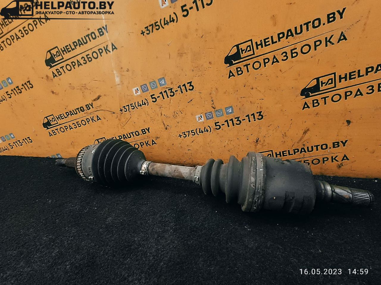 полуось передняя левая (приводной вал, ШРУС) Daewoo Nubira J100 1998, 2.0 л., бензин, МКПП, красный / зеленый, седан - фото №1
