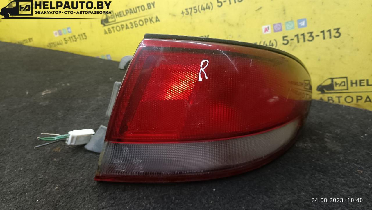 фонарь задний правый Mazda Xedos 6 1 поколение 1996, 2.0 л., бензин, АКПП, черный, седан - фото №1