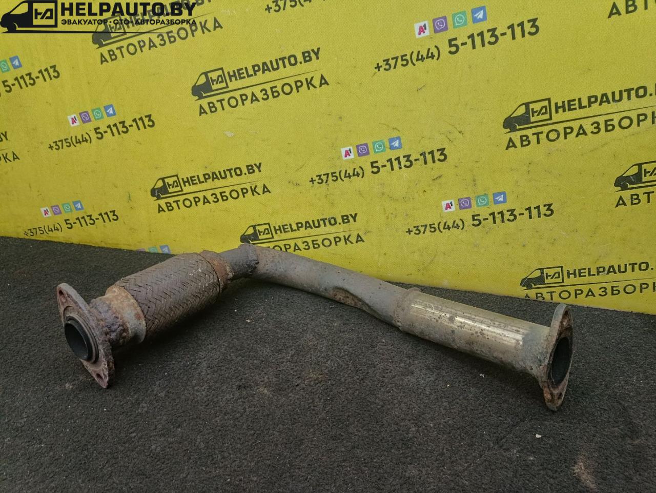 труба приемная глушителя Toyota Carina E 1 поколение T190 1995, 2.0 л., 2C, дизель, МКПП, бордовый, хетчбэк 5 дв., передний привод - фото №1