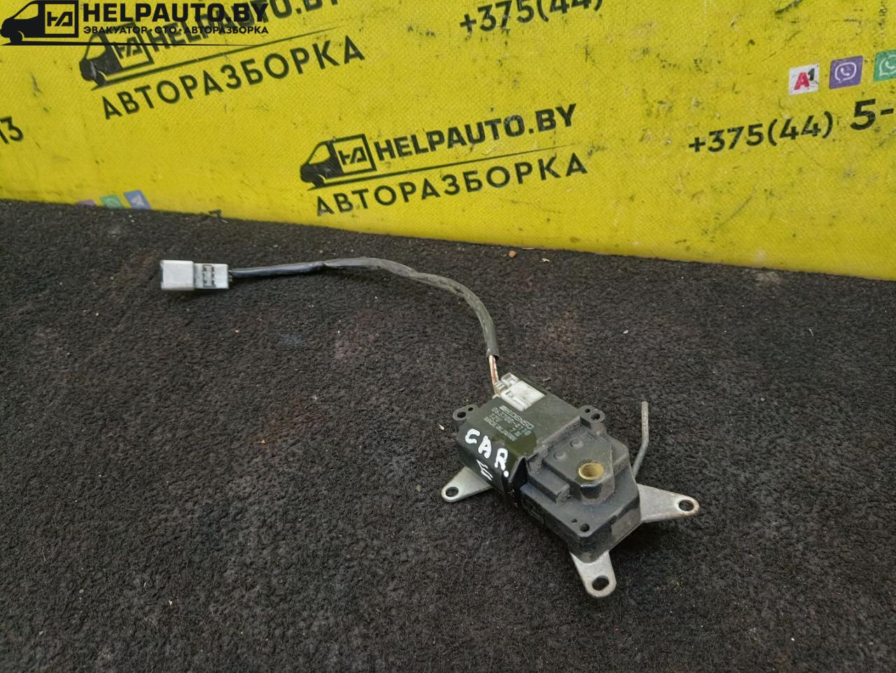 моторчик заслонки печки Toyota Carina E 1 поколение T190 1997, 2.0 л., 2C, дизель, МКПП, черный, универсал, передний привод - фото №1