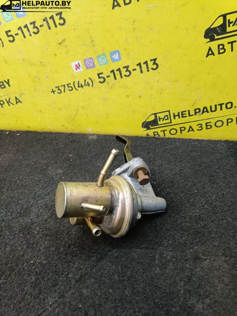 топливный насос (магистральный) Mazda 626 3 поколение 1990, 2.0 л., F8 (12V), бензин, 5МКПП, серебристый, седан, передний привод - фото №1