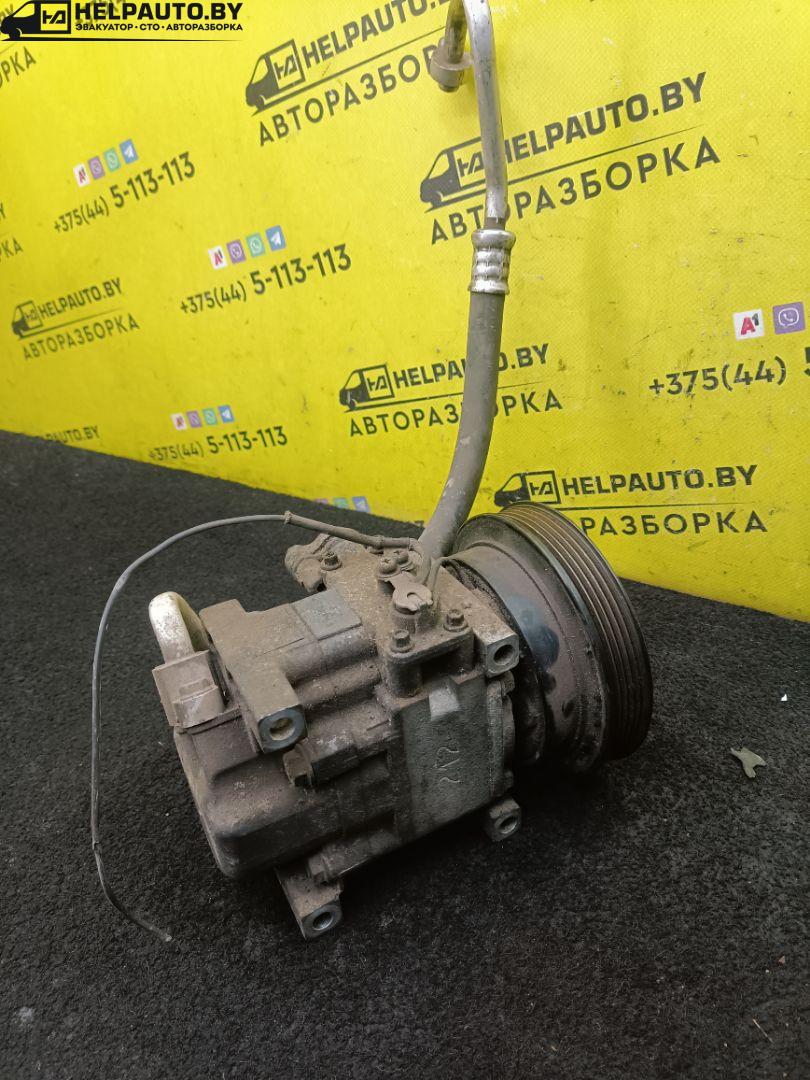 компрессор кондиционера Mazda 626 3 поколение 1990, 1.8 л., бензин, МКПП, серый, седан, передний привод - фото №1