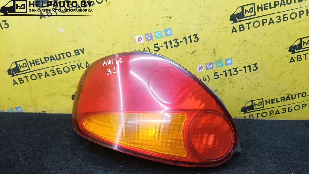 фонарь задний левый Daewoo Matiz M100 1999, 0.8 л., бензин, МКПП, серебристый, хетчбэк 5 дв., передний привод - фото №1