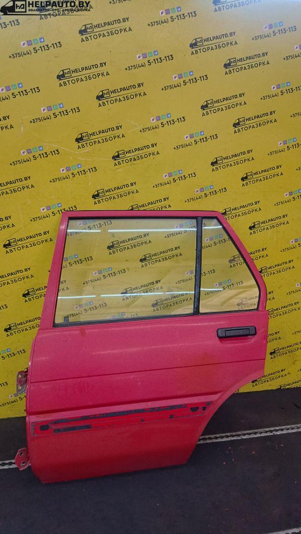 дверь задняя левая Toyota Corolla 5 поколение (E80) 1984, 1.3 л., бензин, МКПП, красный, хетчбэк 5 дв., передний привод - фото №1