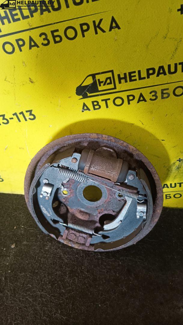 механизм развода задних тормозных колодок Fiat Punto 1 поколение 1997, 1.2 л., бензин, МКПП, красный, хетчбэк 3 дв., передний привод - фото №1